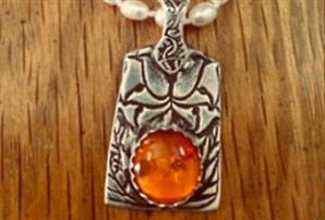 Silver Pendant with Amber Cabochon Quartz Center  by Dani'z Designz